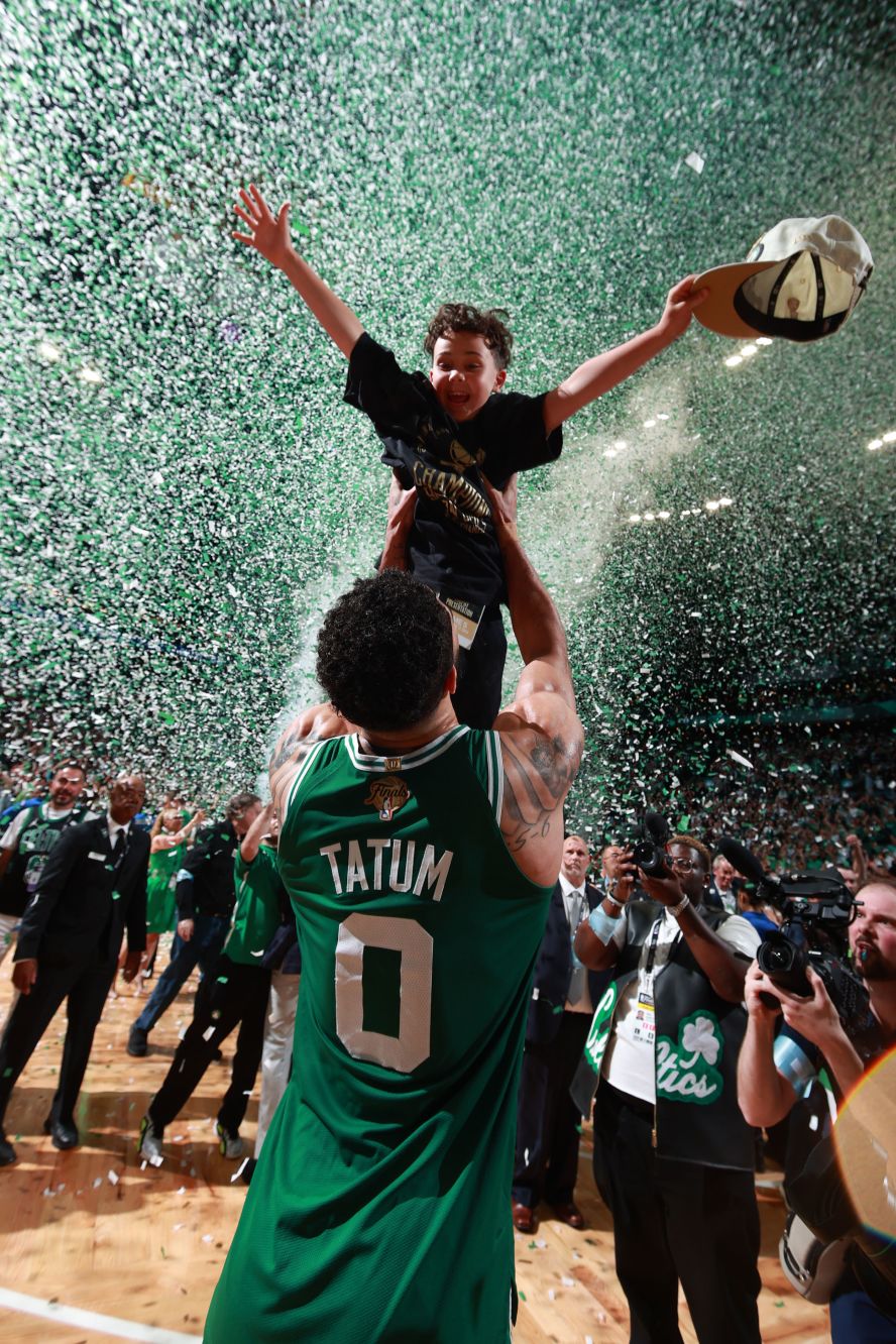 Boston Celtics star Jayson Tatum lifts his son, Deuce, after the <a href="https://www.cnn.com/2024/06/17/sport/nba-finals-celtics-mavericks-game-5-spt-intl/index.html">Celtics won the NBA championship</a> on Monday, June 17. The Celtics defeated the Dallas Mavericks in five games to secure their league-record 18th title.