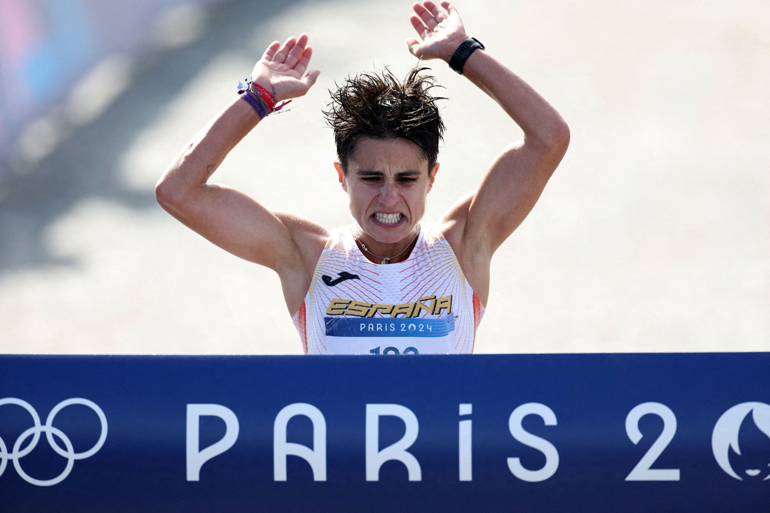 Spain's María Pérez crosses the finish line <a href="https://www.cnn.com/sport/live-news/paris-olympics-news-2024-08-07#h_64c55bb3631025c464b94926361b5446">to win gold in the marathon mixed relay race walk</a> on August 7. Her partner was Álvaro Martín.