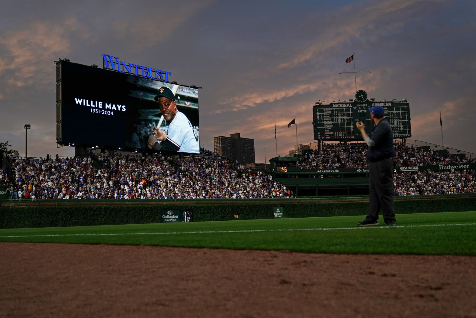 A photo of baseball great Willie Mays is displayed on the Wrigley Field video board in Chicago on Tuesday, June 18. Mays, a Hall of Famer who shined in all facets of the game and made a dramatic catch in the 1954 World Series, <a href="https://www.cnn.com/2024/06/18/sport/willie-mays-dies/index.html">died Tuesday</a> at the age of 93. <a href="http://www.cnn.com/2024/06/18/us/gallery/willie-mays-life-in-pictures/index.html">See his life in pictures</a>.