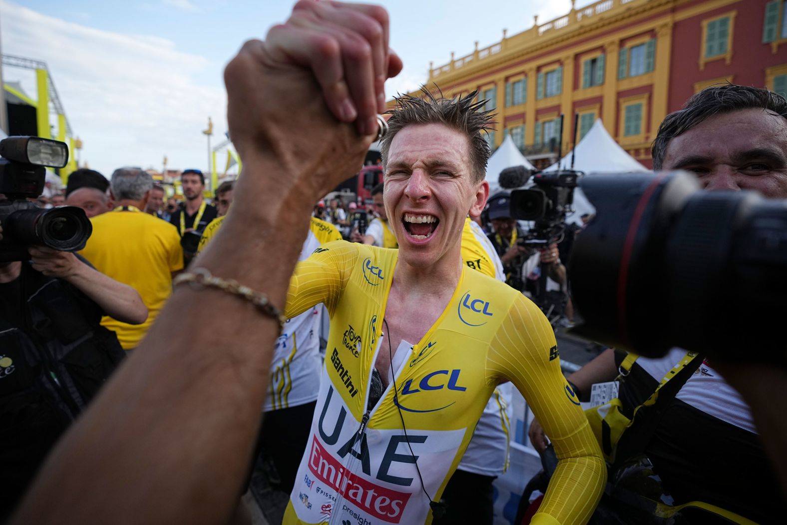 Tour de France winner Tadej Pogačar celebrates in Nice, France, on Sunday, July 21. The Slovenian <a href="https://www.cnn.com/2024/07/21/sport/tadej-pogacar-tour-de-france-spt-intl/index.html">dominated the race from start to finish</a>, accomplishing feats not achieved for more than a quarter of a century.