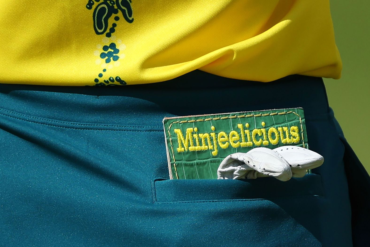 The yardage book for Australian golfer Minjee Lee is seen in her back pocket on August 7.