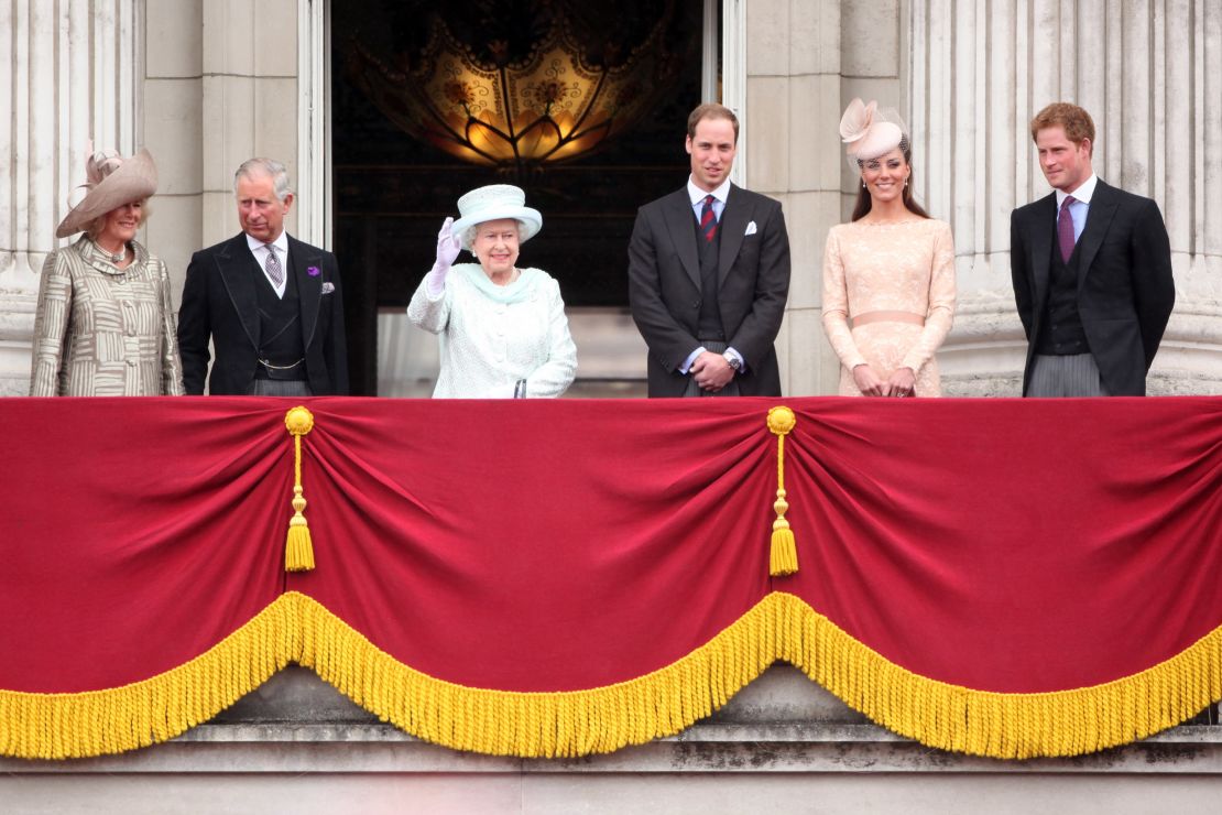 The British royal family wave to crowds from Buckingham Palace during Diamond Jubilee commemorations in 2012.