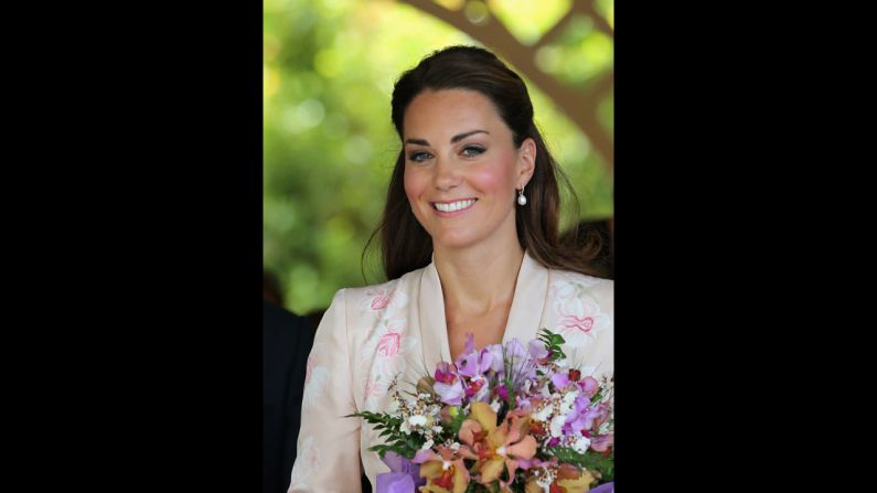 Catherine leaves Singapore Botanic Gardens after visiting on Tuesday.