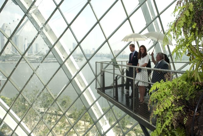 The couple look out over a balcony at Gardens by the Bay on Wednesday.