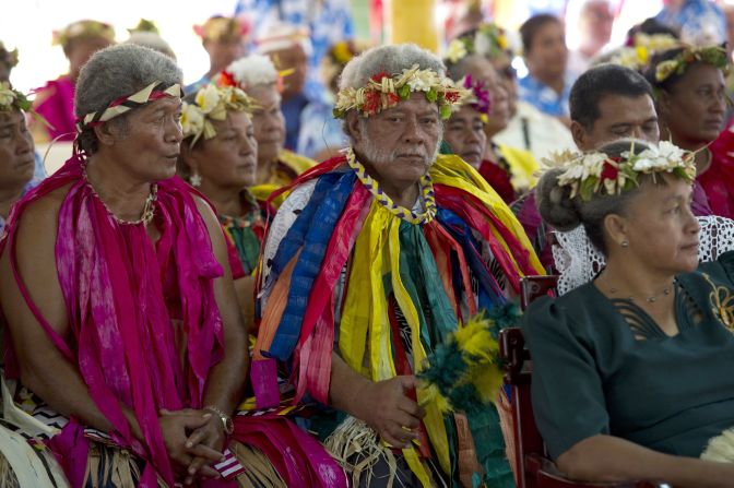 Local participants watch as the duke and duchess conclude the portion of their trip in Tuvalu on Wednesday.