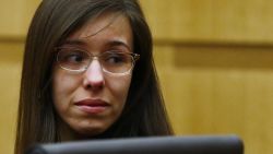 Jodi Arias reacts as a guilty verdict is read in her first-degree murder trial in Phoenix, Arizona, May 8, 2013. Arias was convicted of first degree murder in the death of 30-year-old Travis Alexander, whose body was found in the shower of his Phoenix valley home in June 2008.