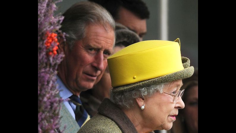 Charles looks over at his mother as they attend the 2009 Braemar Highland Games in Scotland. 