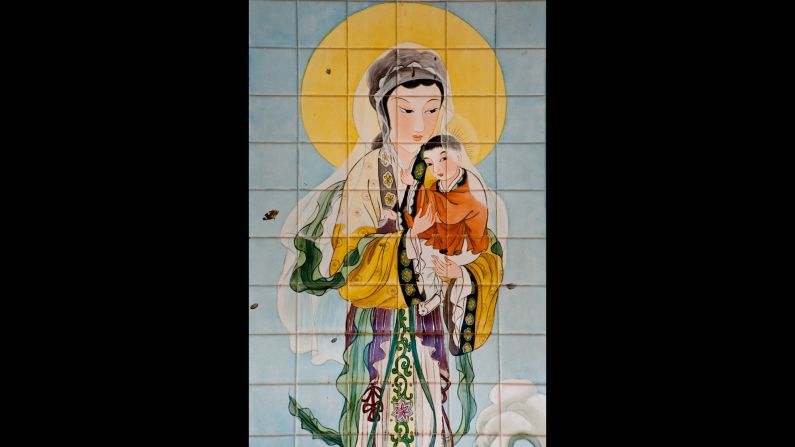 A painted tile artwork from China at the Church of the Annunciation in Nazareth, Israel, depicts Mary and Jesus. 