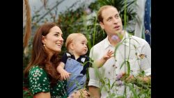 This photo taken Wednesday, July 2, and released Monday, July 21, to mark Prince George's first birthday, shows Britain's Prince William and Kate Duchess of Cambridge and the Prince during a visit to the Sensational Butterflies exhibition at the Natural History Museum, London.