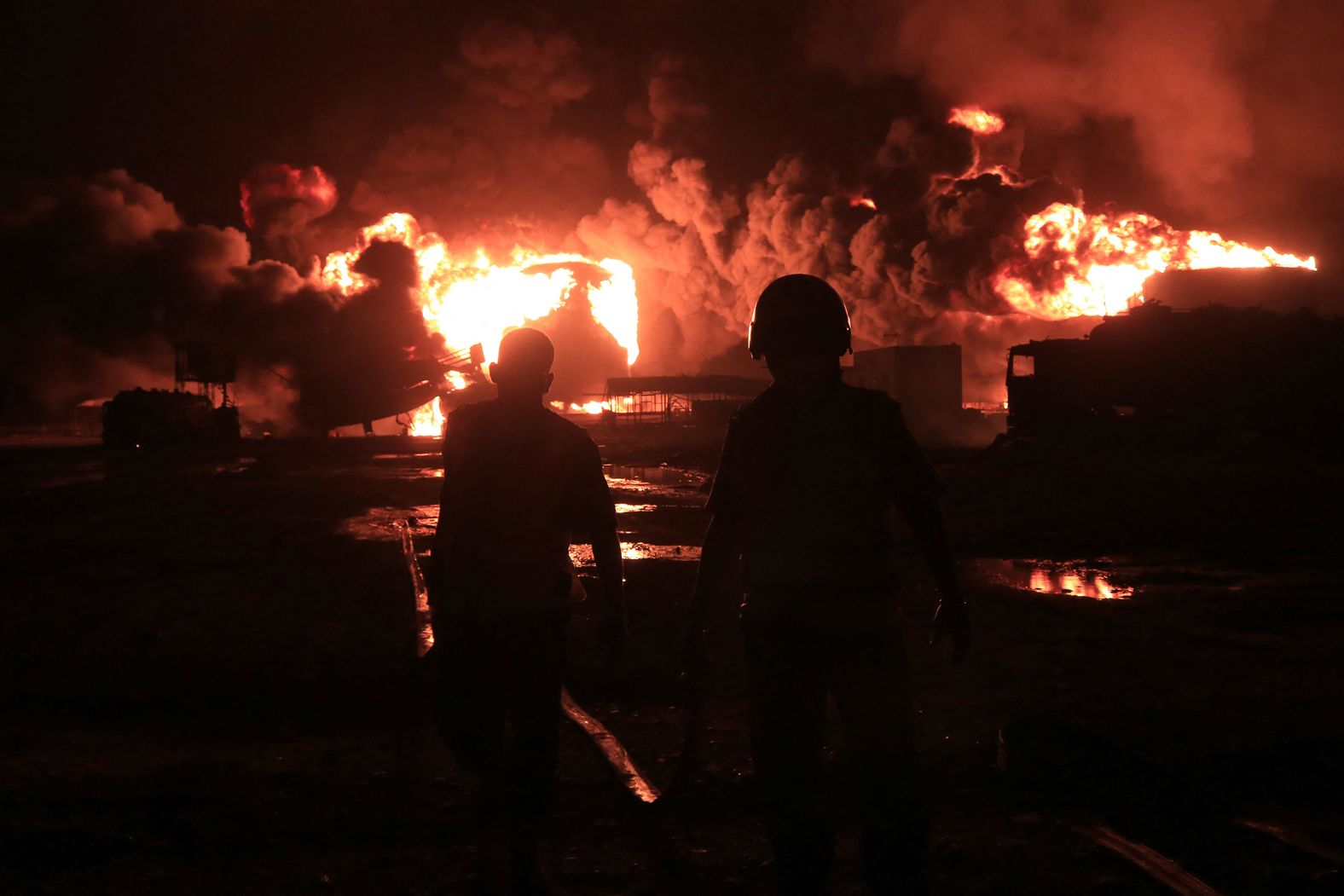 Rescuers arrive at the scene of a giant fire at an oil storage facility in Hodeidah, Yemen, on Saturday, July 20. <a href="https://www.cnn.com/2024/07/21/middleeast/israel-strikes-houthi-rebels-explainer-intl/index.html">Israel struck Yemen for the first time</a> following a deadly drone attack launched by Houthi rebels in Tel Aviv, Israel.