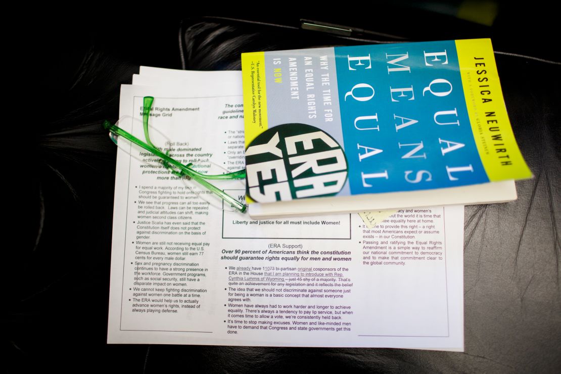 Maloney's reading glasses and "Equal Means Equal," a new book by ERA Coalition President Jessica Neuwirth, rest atop ERA talking points on a couch in the congresswoman's office.