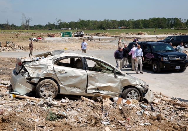 Touring tornado damage in Vilonia, Arkansas, on May 7, 2014. 