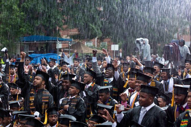 Graduates cheering the President during a heavy downpour at Morehouse College in Atlanta, Georgia, on May 19, 2013. 