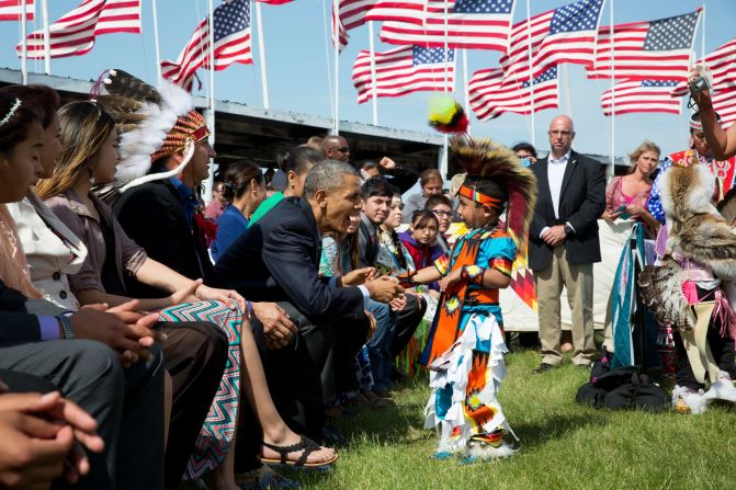 Greeting a young boy during a Flag Day celebration on June 13, 2014, at the Standing Rock Sioux Tribe Reservation in Cannon Ball, North Dakota. Cannon Ball is south of Bismarck. 