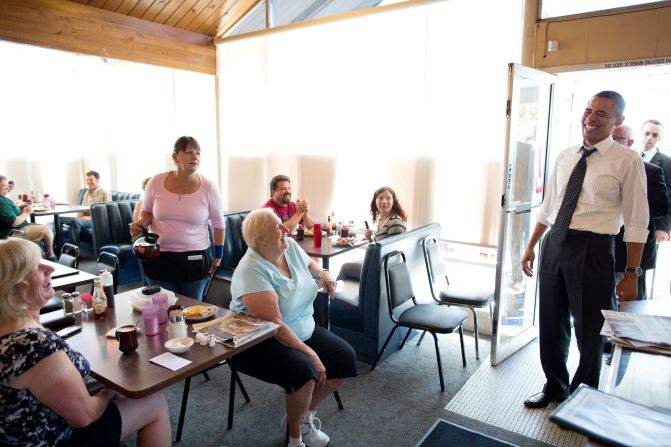 Reacting to a quip from a patron at the Gateway Breakfast House in Portland, Oregon, on July 24, 2012. 