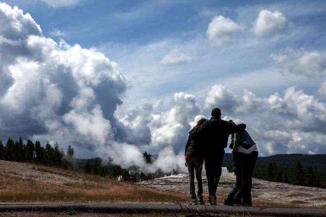 Watching geysers with the family at Yellowstone National Park in Wyoming on August 15, 2009. 