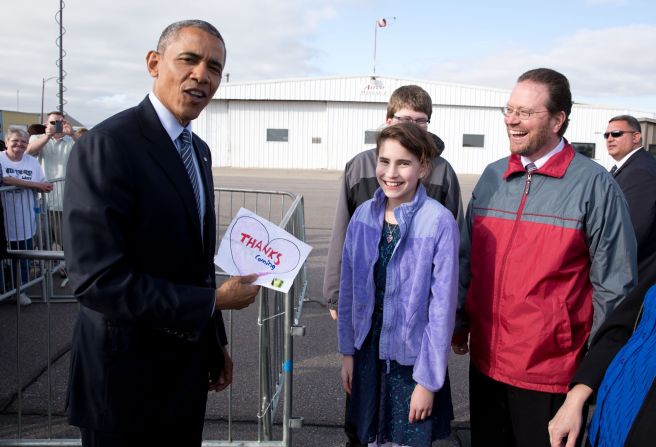 President Barack Obama, visiting Watertown, South Dakota, on Friday, May 8, shows off a note given to him by 11-year-old Rebecca Kelley. Rebecca had written him a letter asking him to visit South Dakota, which is the 50th state Obama has visited during his time in office. White House photographer Pete Souza highlights a picture from each state.