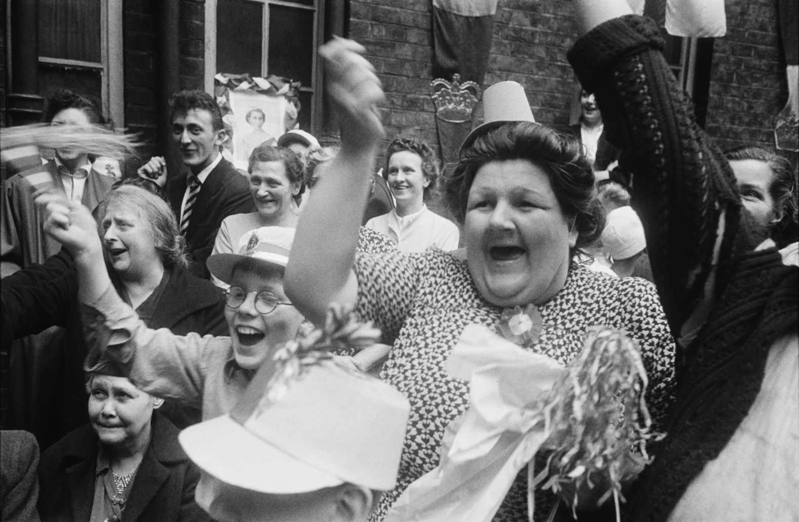 Londoners hold a street party to celebrate the coronation.