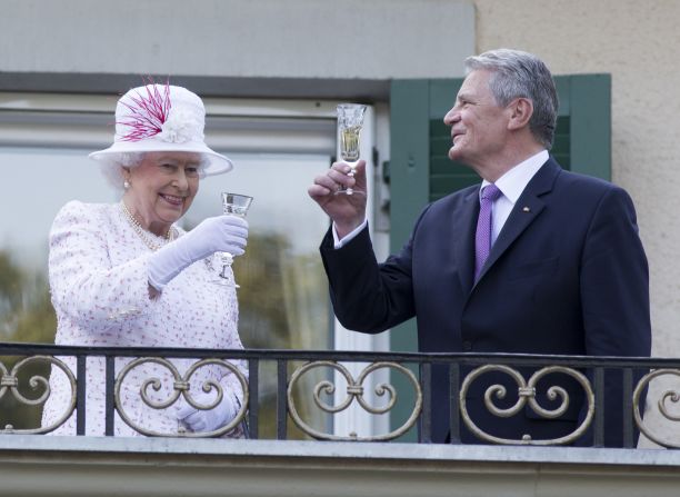 The Queen raises a glass with the President of Germany, Joachim Gauck, as they attend a garden party at the British Embassy residence on a <a href="http://edition.cnn.com/2015/06/23/europe/uk-germany-queen-state-visit/">state visit </a>to the country on June 25, 2015 in Berlin. 