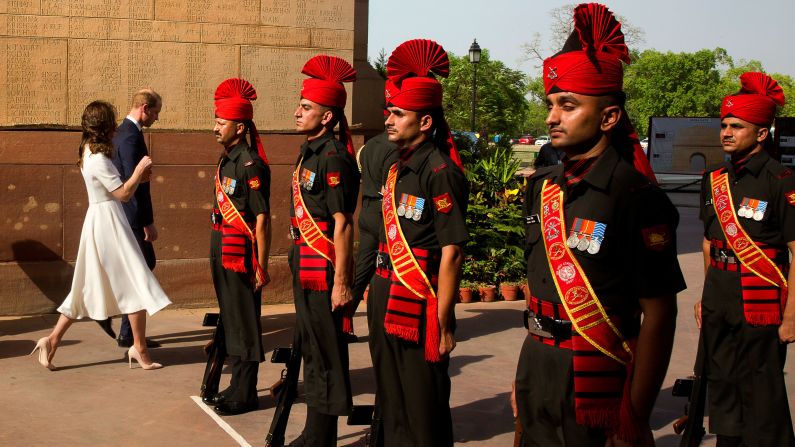 William and Catherine leave the India Gate after paying their respects.