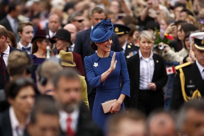 The duchess waves to fans at the Legislative Assembly.