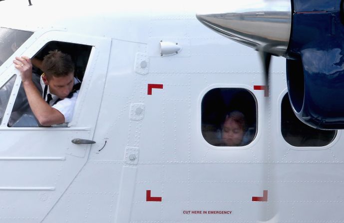 Prince George of Cambridge looks out of the window of a sea-plane in Victoria on October 1.