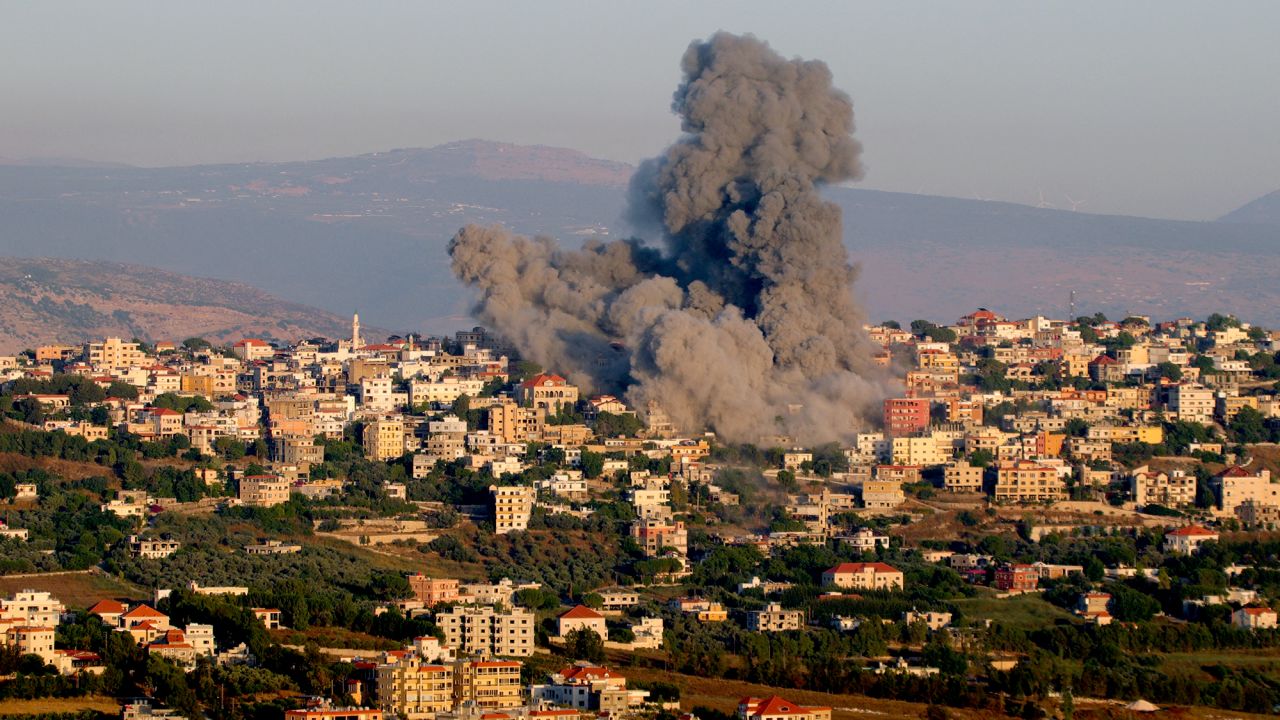 Smoke billows following an Israeli air strike that targeted a house in the southern Lebanese village of Khiam near the Lebanese-Israeli border on June 21.