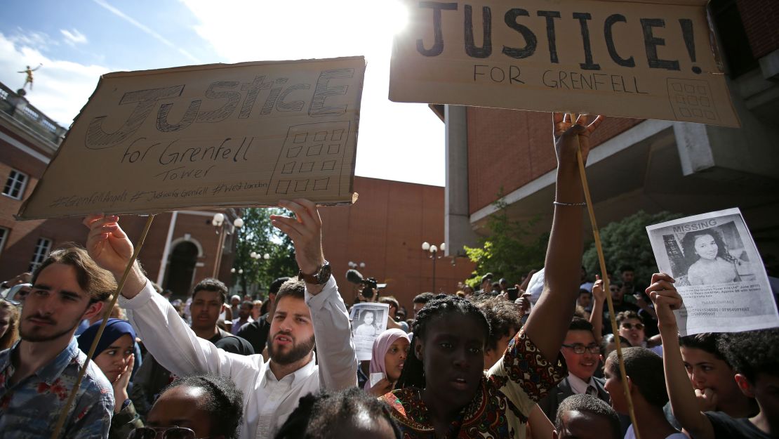 Protesters gather at Kensington Town Hall on Friday afternoon.