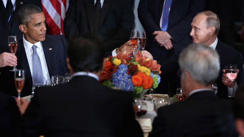 US President Barack Obama shares a toast with Putin at a luncheon in New York hosted by UN Secretary-General Ban Ki-moon in September 2015. "Amid the inevitable trials and setbacks, may we never relax in our pursuit of progress and may we never abandon the pursuit of peace," Obama said before clinking glasses. "Cheers." The two, bitterly at odds over issues in Ukraine and Syria, <a href="http://www.cnn.com/2015/09/28/politics/obama-putin-meeting-syria-ukraine/" target="_blank">had a closed-door meeting</a> later in the day.