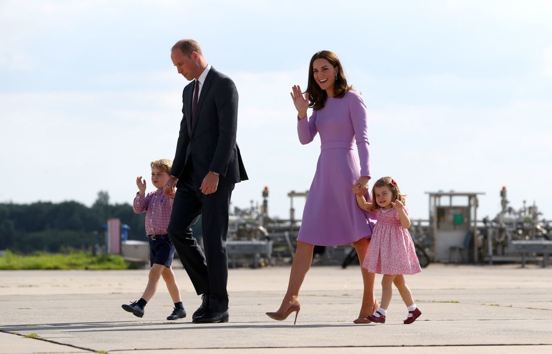 The royal couple with their two children on a three-day tour in Germany on July 21.