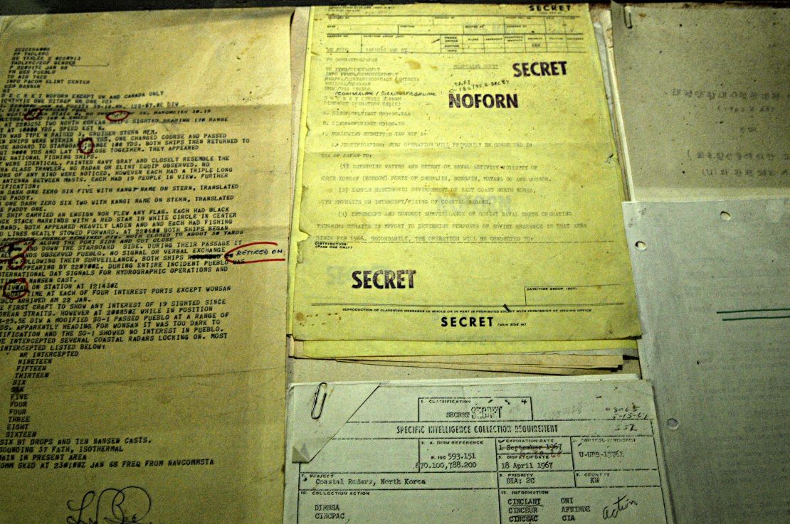 Top secret files recovered from the USS Pueblo seen in a propaganda photo released by North Korea.