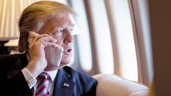 President Donald Trump talks on the phone aboard Air Force One during a flight to Philadelphia, Pennsylvania, to address a joint gathering of House and Senate Republicans, Thursday, January 26, 2017. This was the Presidentâs first Trip aboard Air Force One. (Official White House Photo by Shealah Craighead)