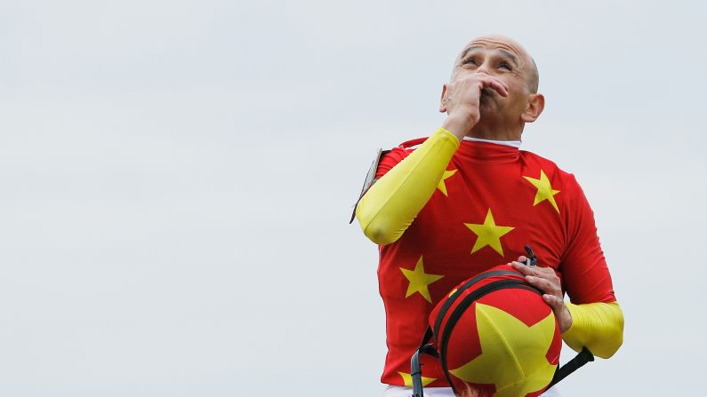 Jockey Mike Smith celebrates after the 150th running of the Belmont Stakes on June 9 in Elmont, New York. Justify is now the 13th Triple Crown winner and the first since American Pharoah in 2015.