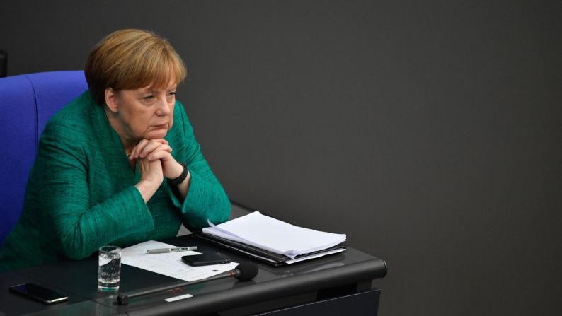 Merkel attends a Bundestag session in June 2018. She pressed lawmakers <a href="https://www.cnn.com/2018/06/28/europe/eu-summit-migration-merkel-intl/index.html" target="_blank">to back a tough but humane asylum and migration policy</a> for the European Union.