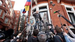 LONDON, ENGLAND - MAY 19:  Julian Assange speaks to the media from the balcony of the Embassy Of Ecuador on May 19, 2017 in London, England.  Julian Assange, founder of the Wikileaks website that published US Government secrets, has been wanted in Sweden on charges of rape since 2012.  He sought asylum in the Ecuadorian Embassy in London and today police have said he will still face arrest if he leaves.  (Photo by Jack Taylor/Getty Images)