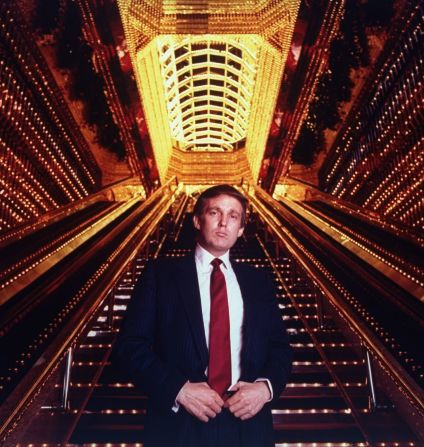 Trump stands in the atrium of Trump Tower.