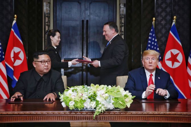 Trump sits with North Korean leader Kim Jong Un during <a href="https://www.cnn.com/interactive/2018/06/politics/trump-kim-summit-cnnphotos/index.html" target="_blank">their historic summit in Singapore</a> in June 2018. It was the first meeting ever between a sitting US president and a North Korean leader. At the end of the summit, they signed a document in which they agreed "to work toward complete denuclearization of the Korean Peninsula." In exchange, Trump agreed to "provide security guarantees" to North Korea.