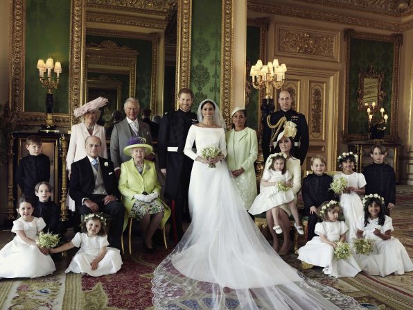 The couple poses with family members after getting married in May 2018.