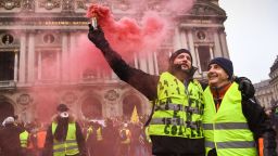 PARIS, FRANCE - DECEMBER 15: Protesters gather at Place de l' Opera during the 'yellow vests' demonstration on December 15, 2018 in Paris, France. The protesters gathered in Paris for a 5th weekend despite President Emmanuel Macron's recent attempts at policy concessions, such as a rise in the minimum wage and cancellation of new fuel taxes. But the 'Yellow Vest' movement, which has attracted malcontents from across France's political spectrum, has shown little sign of slowing down. (Photo by Jeff J Mitchell/Getty Images)