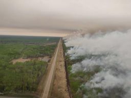 Smoke rises from a wildfire in High Level, Alberta, Canada, on May 22.