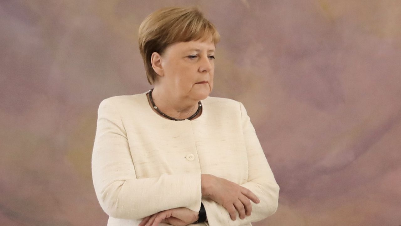 German Chancellor Angela Merkel attends a ceremony where the country's new Justice Minister was given her certificate of appointment by the German President at the presidential Bellevue Palace in Berlin on June 27, 2019. - During the ceremony, Merkel suffered a new shaking spell, just one week after sparking concerns by visibly trembling at another official ceremony. (Photo by Kay Nietfeld / dpa / AFP) / Germany OUT        (Photo credit should read KAY NIETFELD/AFP/Getty Images)