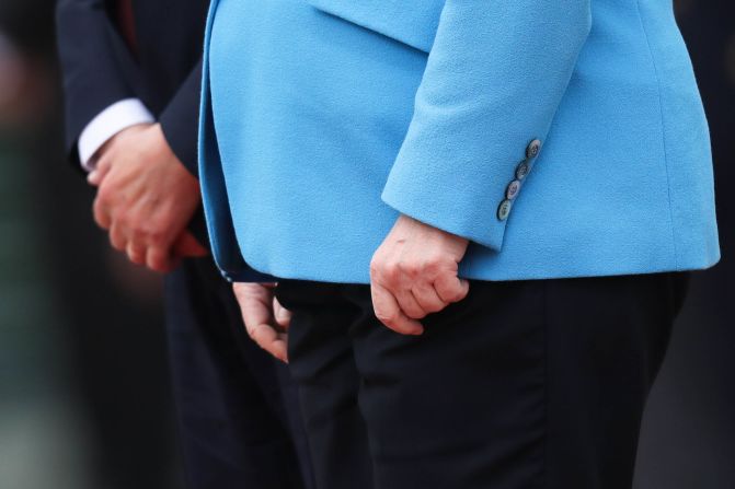 The hands of Merkel and Finnish Prime Minister Antti Rinne are seen as they listen to national anthems in Berlin in July 2019. Merkel's body <a href="https://edition.cnn.com/2019/07/10/europe/angela-merkel-shaking-third-time-grm-intl/index.html" target="_blank">visibly shook again,</a> raising concerns over her health. She said she was fine and that she has been "working through some things" since she was first seen shaking in June.