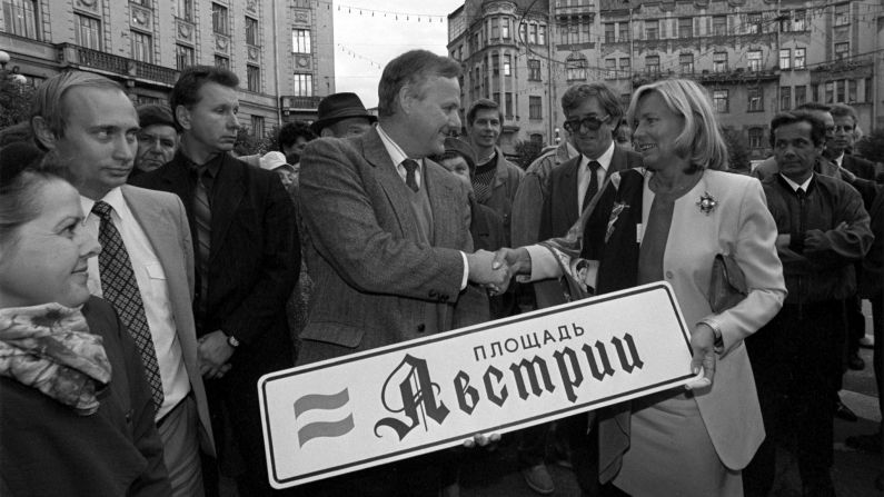 From 1991 to 1994, Putin served as the chairman of St. Petersburg's Foreign Relations Committee. He also served as the city's deputy mayor. Here, Putin stands with St. Petersburg Mayor Anatoly Sobchak during a ceremony in September 1992.