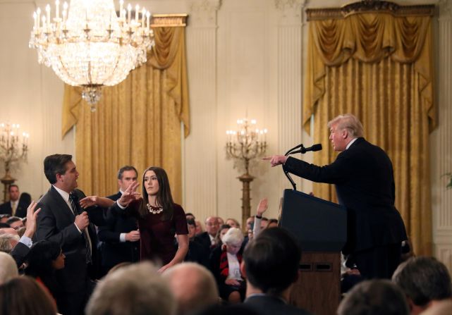 A White House staff member reaches for the microphone held by CNN's Jim Acosta as he questions Trump during a news conference in November 2018. Later that day, in a stunning break with protocol, the White House said that it was <a href="https://www.cnn.com/2018/11/07/media/trump-cnn-press-conference/index.html" target="_blank">suspending Acosta's press pass</a> "until further notice." A federal judge later ordered the White House <a href="https://www.cnn.com/2018/11/16/media/cnn-trump-lawsuit-hearing/index.html" target="_blank">to return Acosta's press pass.</a> 