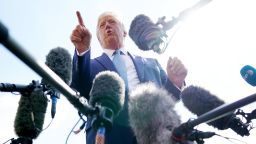 U.S. President Donald Trump talks to journalists on the South Lawn of the White House, Friday, October 4, in Washington, DC. 