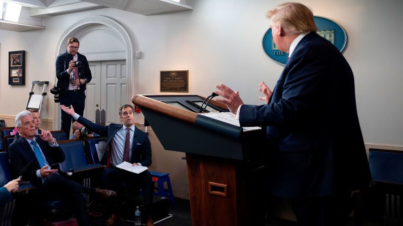 Trump ripped into NBC News' Peter Alexander, seated, during a White House coronavirus briefing in March 2020. Alexander had asked Trump whether he was giving Americans "false hope" by touting unproven coronavirus drugs. Toward the end of the exchange, Alexander cited the latest pandemic statistics showing thousands of Americans are now infected and millions are scared. Alexander asked, "What do you say to Americans who are scared?" Trump shook his head. "I say that you are a terrible reporter," he replied. "That's what I say." The president then launched into a rant against Alexander, NBC and its parent company, Comcast. "You're doing sensationalism," Trump charged. 