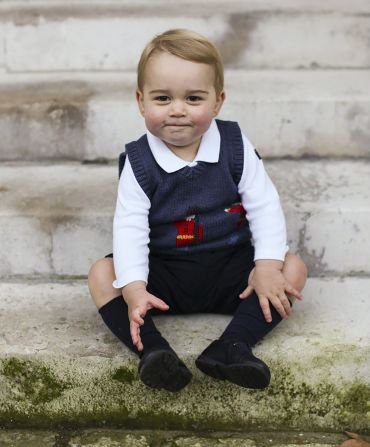 George poses in a Kensington Palace courtyard in December 2014.