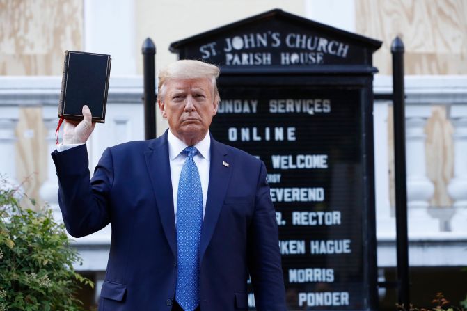 Trump holds a Bible outside St. John's Episcopal Church during a <a href="https://www.cnn.com/videos/politics/2020/06/02/mariann-budde-bishop-st-johns-trump-bible-photo-ac360-vpx.cnn" target="_blank">photo op</a> in Washington, DC, in June 2020. Part of the church was set on fire during protests the night before. Before Trump's photo op, police cleared out peaceful protesters with rubber bullets, tear gas and flash bangs.