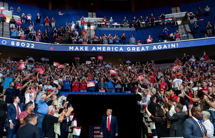 Trump arrives at <a href="http://www.cnn.com/2020/06/20/politics/gallery/trump-rally-tulsa/index.html" target="_blank">his campaign rally</a> in Tulsa, Oklahoma, in June 2020. It was his first rally since the start of the coronavirus pandemic, and the indoor venue <a href="https://www.cnn.com/2020/06/20/politics/donald-trump-rally-tulsa-coronavirus/index.html" target="_blank">generated concerns</a> about the potential spread of the virus. <a href="https://www.cnn.com/2020/06/21/politics/trump-rally-tulsa-attendance/index.html" target="_blank">About 6,200 people showed up</a> to the BOK Center, which seats 19,199.