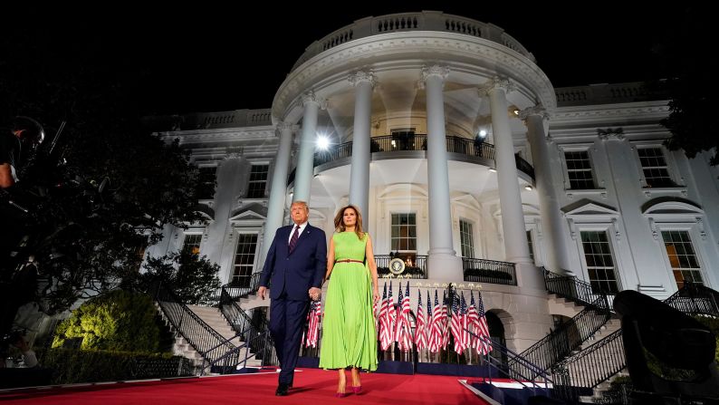 Trump is accompanied by the first lady as he arrives for <a href="https://www.cnn.com/2020/08/27/politics/gop-convention-donald-trump-joe-biden/index.html" target="_blank">his nomination acceptance speech</a> in August 2020. "I stand before you tonight honored by your support, proud of the extraordinary progress we have made together over the last four incredible years, and brimming with confidence in the bright future we will build for America over the next four years," Trump said in his speech, which closed the <a href="http://www.cnn.com/2020/08/24/politics/gallery/republican-convention-2020/index.html" target="_blank">Republican National Convention.</a>